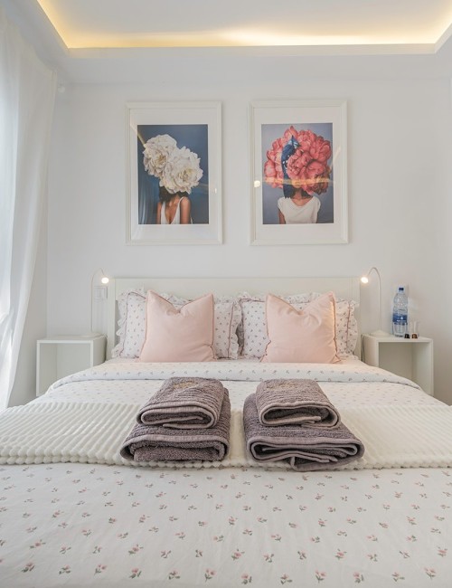 Interior de la habitación Estándar Doble en Telde, Gran Canaria, con una cama cómoda